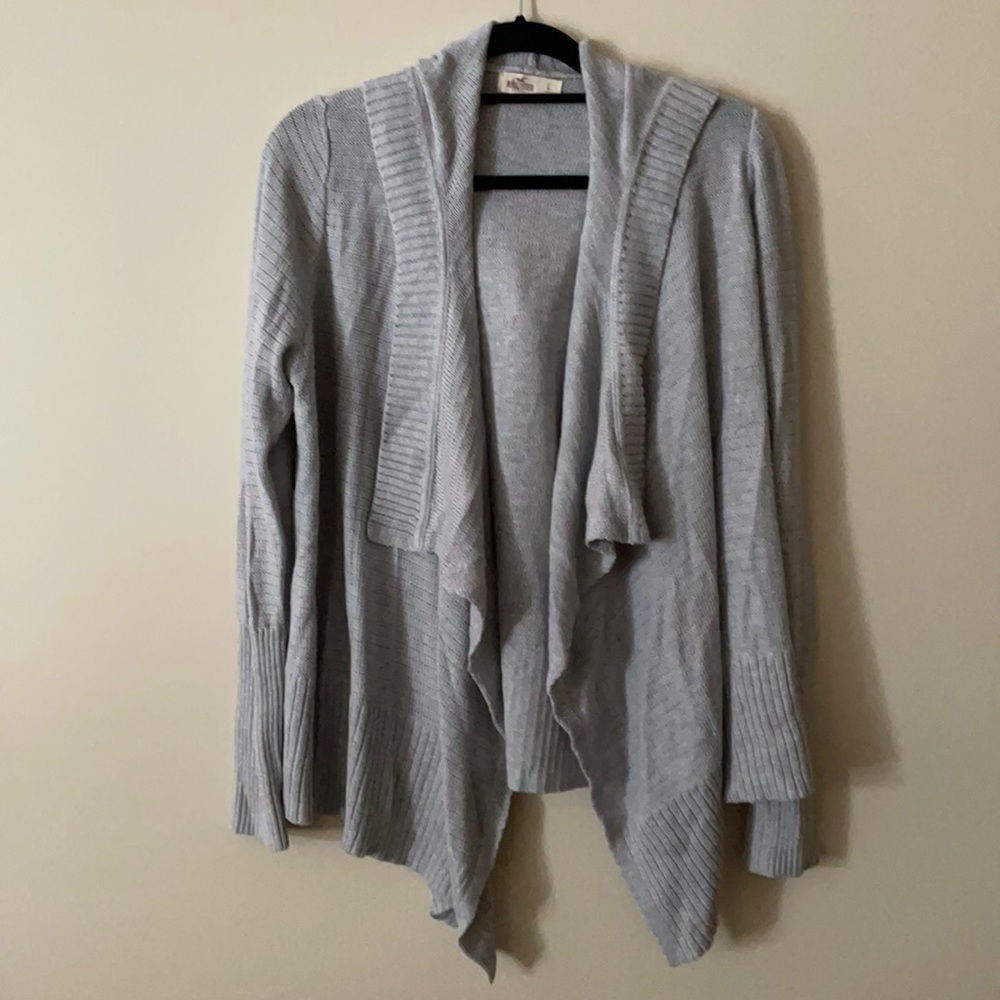 Light grey open front knit cardigan with hood.